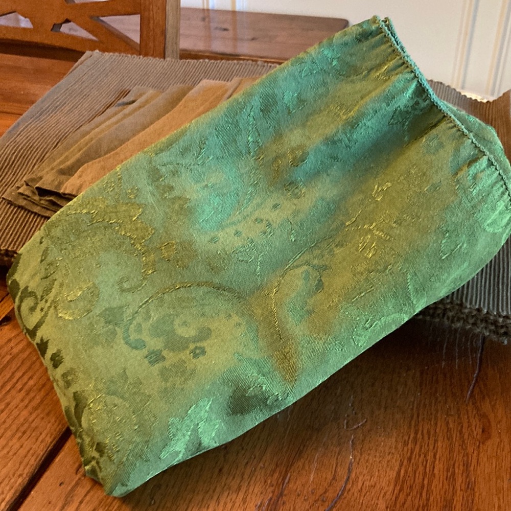 Beautiful emerald green tablecloth.